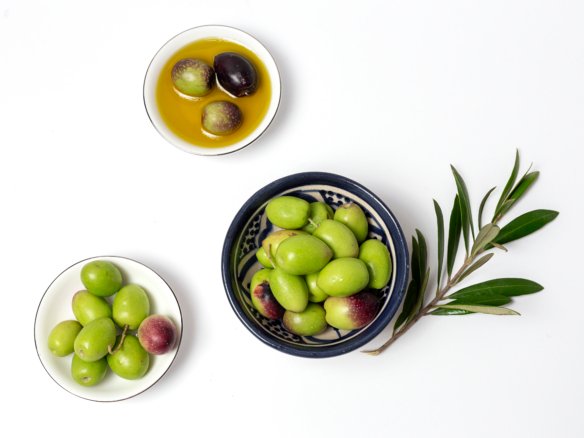 fresh Spanish extra virgin olive oil with olives