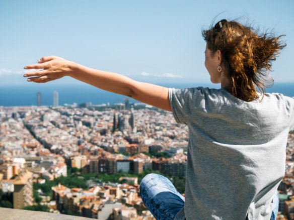 rear view woman looking barcelona cityscape