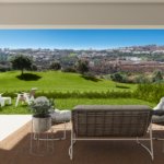 Sunlit terrace with panoramic golf and valley views