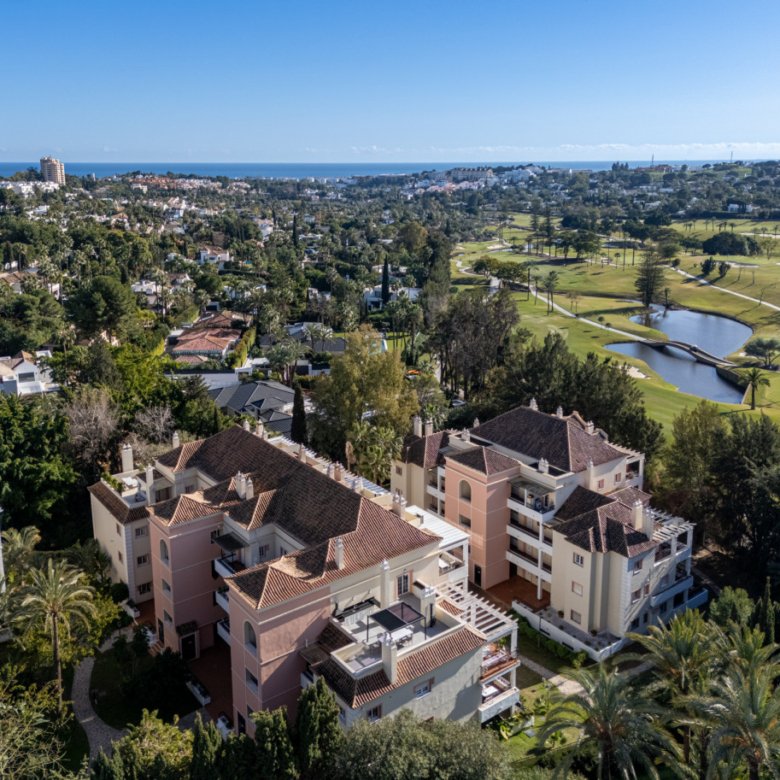 River Garden duplex penthouse terrace with golf and sea views
