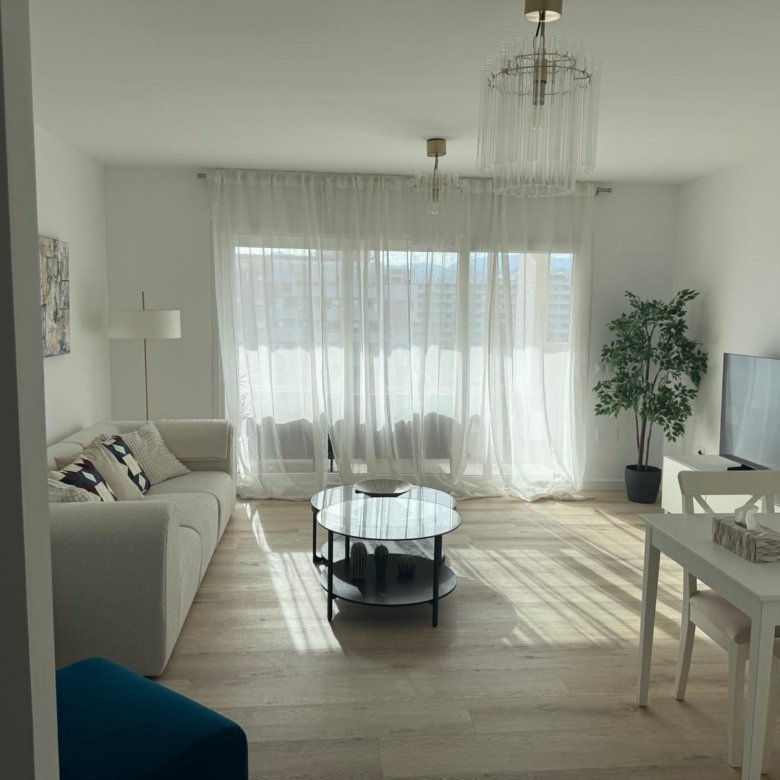 Albatros 5th-floor living room opening to a private terrace, Nueva Andalucía